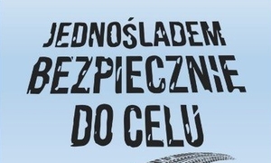 Zdjęcie przedstawiające plakat z napisem &quot;Jednośladem bezpiecznie do celu&quot;