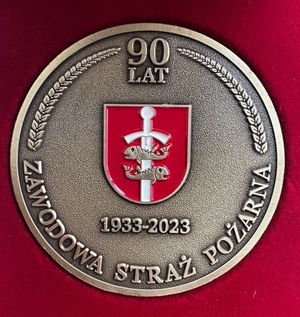 Zdjęcie przedstawiające medal pamiątkowy