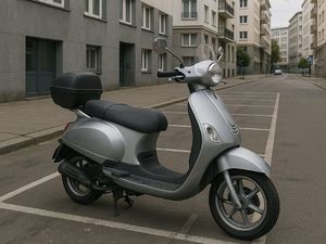Zdjęcie poglądowe, przedstawiające skuter.